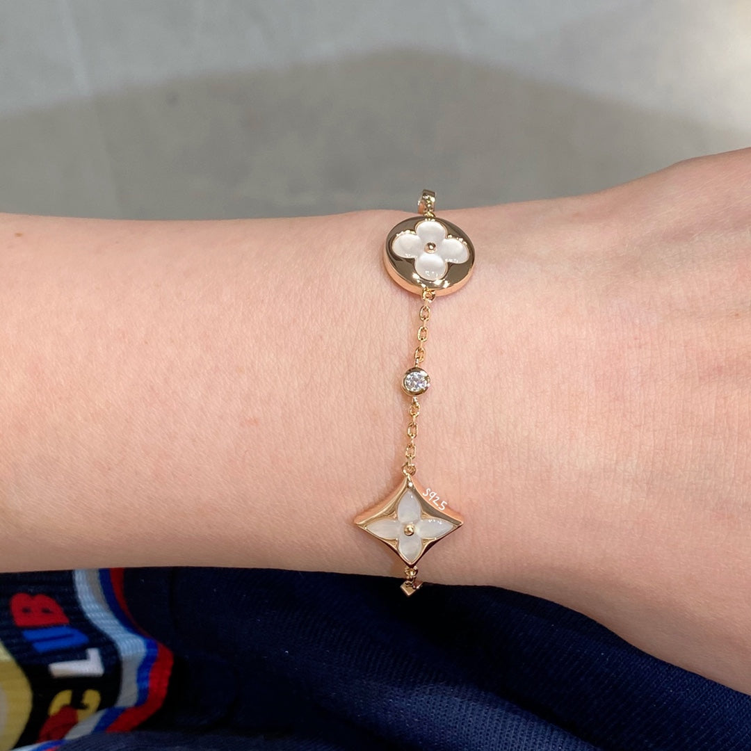 [Angela Jewellery]STAR AND SUN 4 MOTIF WHITE MOP PINK GOLD BRACELET